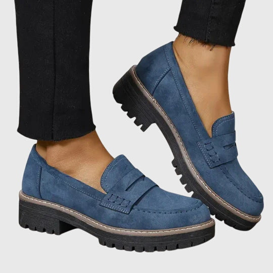 Women’s suede slip-on loafers with classic design and non-slip sole.