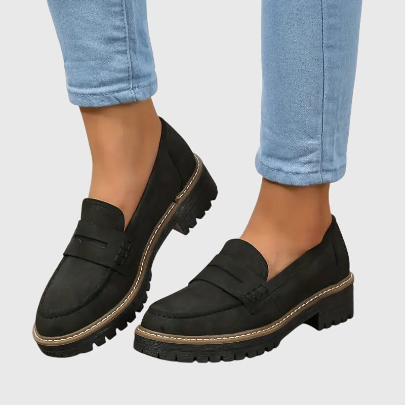 Women’s suede slip-on loafers with classic design and non-slip sole.