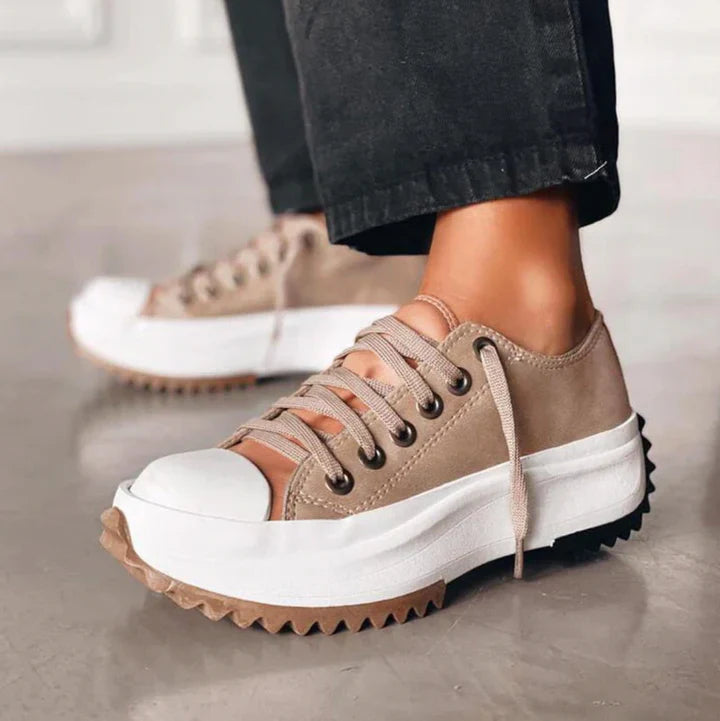 Women’s Elisa™ platform canvas sneakers with elevated sole, EVA cushioning, and durable design for all-day comfort and style.