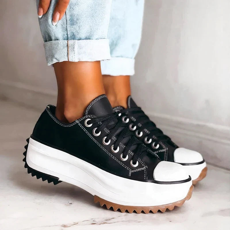 Women’s Elisa™ platform canvas sneakers with elevated sole, EVA cushioning, and durable design for all-day comfort and style.