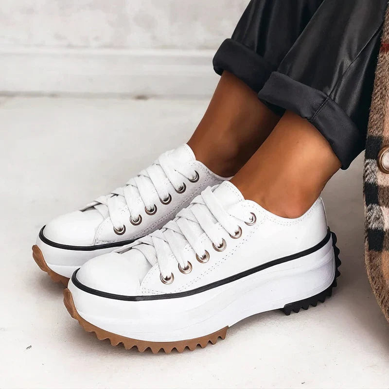 Women’s Elisa™ platform canvas sneakers with elevated sole, EVA cushioning, and durable design for all-day comfort and style.