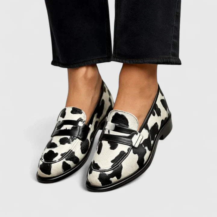 Women’s elegant slip-on loafers with cushioned insole and lightweight design.
