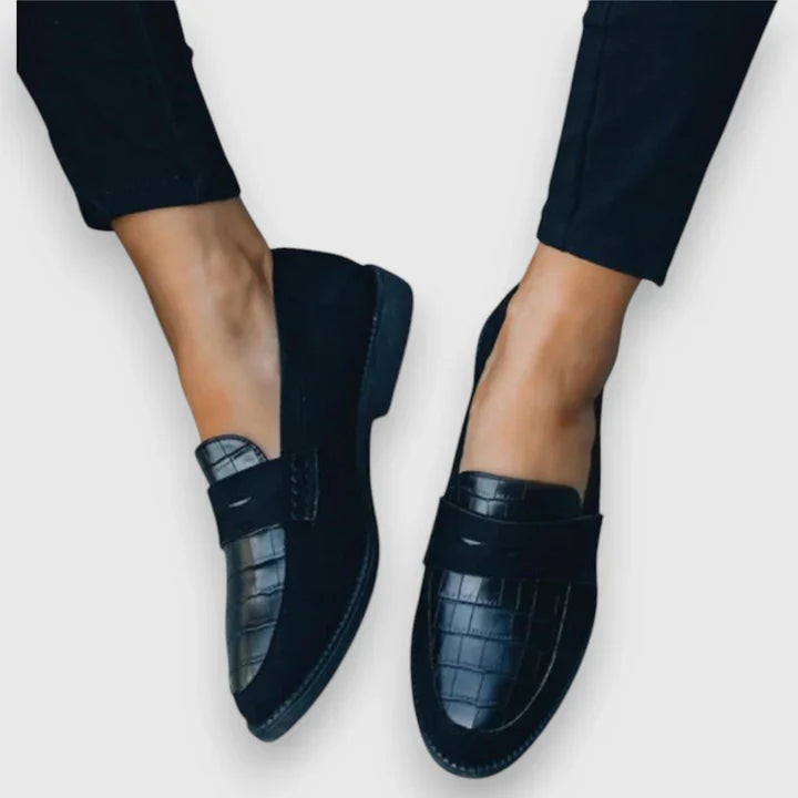Women’s elegant slip-on loafers with cushioned insole and lightweight design.