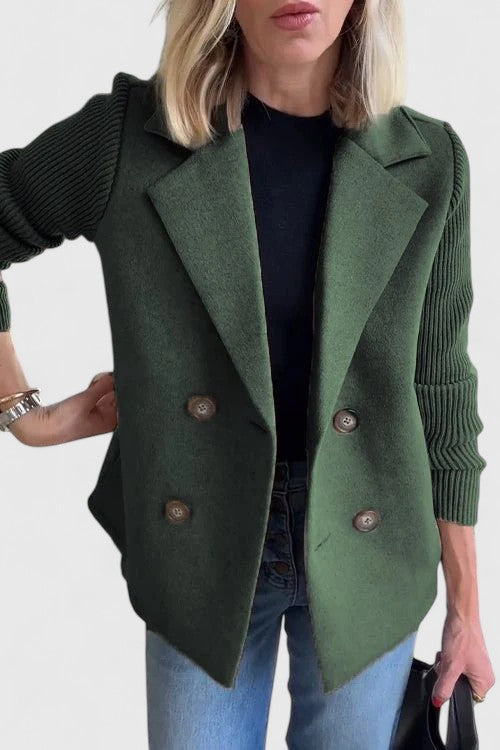 Women’s tailored blazer jacket with contrast sleeves and double-breasted front.