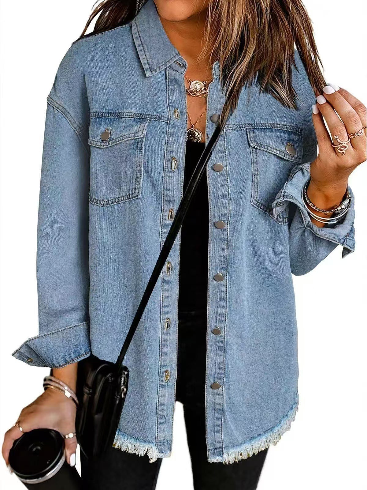 Women’s classic denim jacket with relaxed fit and pockets for everyday casual layering.