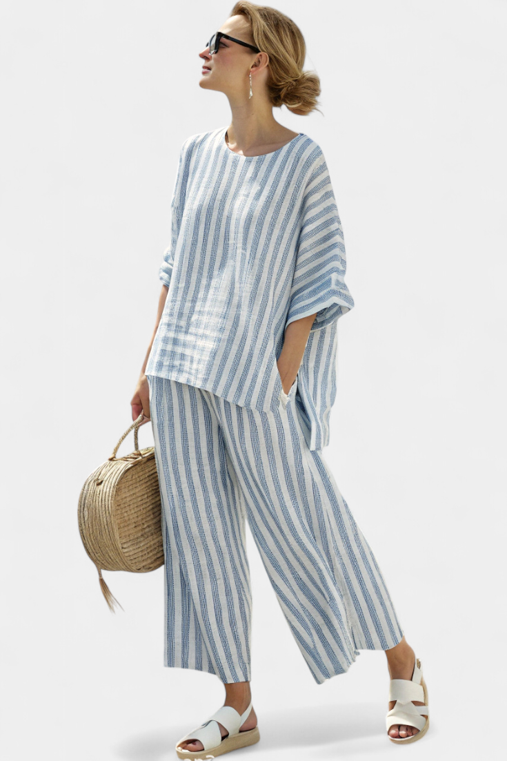 Women’s blue striped top and relaxed pants designed for breathable comfort and effortless summer style.
