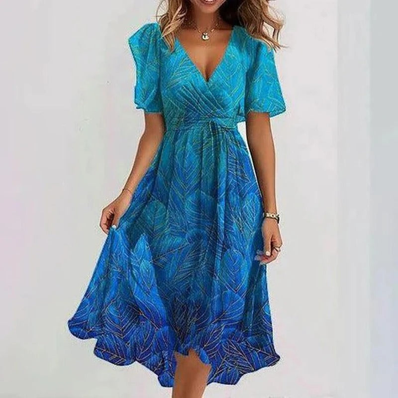 Women’s colourful flared dress with tailored silhouette, breathable fabric, and versatile styling for parties and daytime wear.