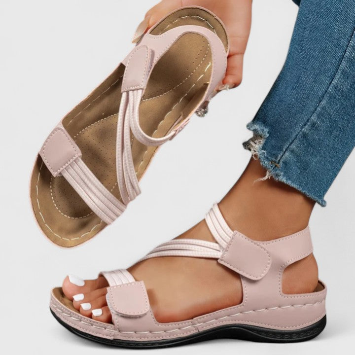 Women’s cushioned support sandals with structured footbed designed for stable and comfortable everyday walking.