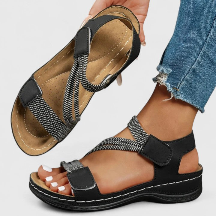 Women’s cushioned support sandals with structured footbed designed for stable and comfortable everyday walking.