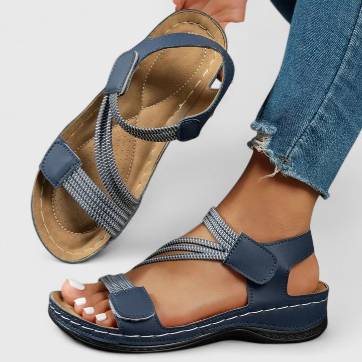 Women’s cushioned support sandals with structured footbed designed for stable and comfortable everyday walking.