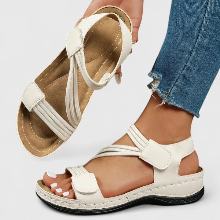 Women’s cushioned support sandals with structured footbed designed for stable and comfortable everyday walking.