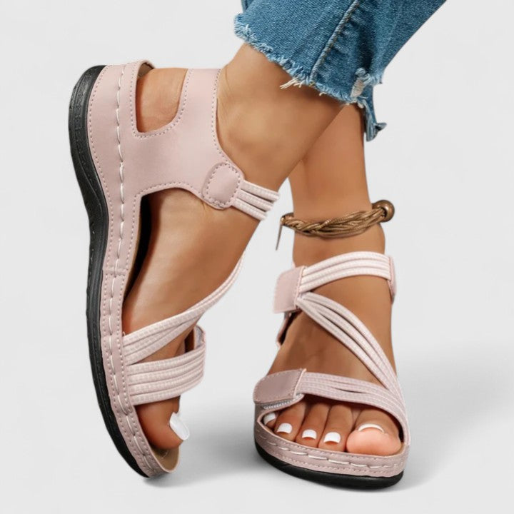 Women’s cushioned support sandals with structured footbed designed for stable and comfortable everyday walking.