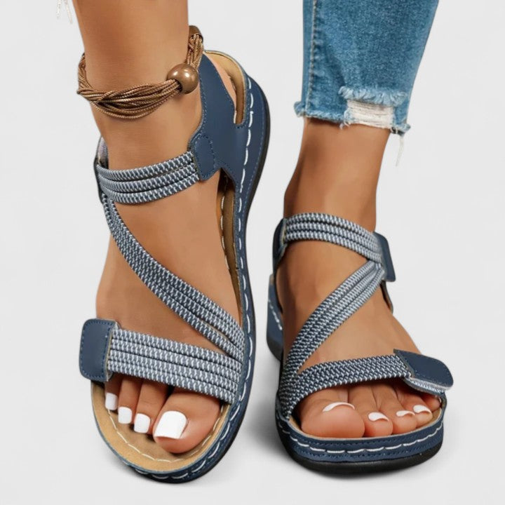 Women’s cushioned support sandals with structured footbed designed for stable and comfortable everyday walking.