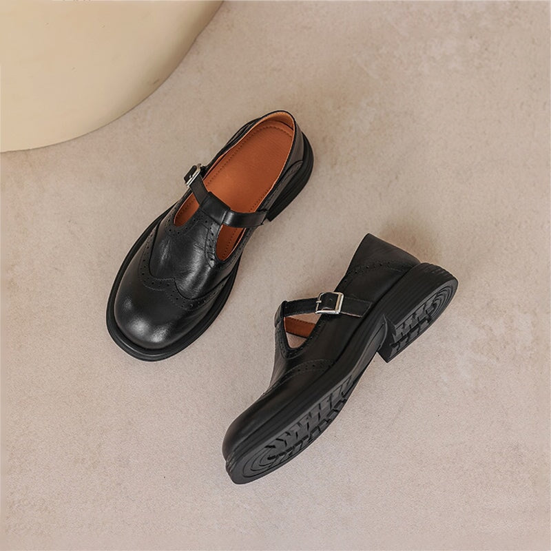 Women’s leather Mary Jane shoes with strap and cushioned sole designed for comfortable everyday walking.