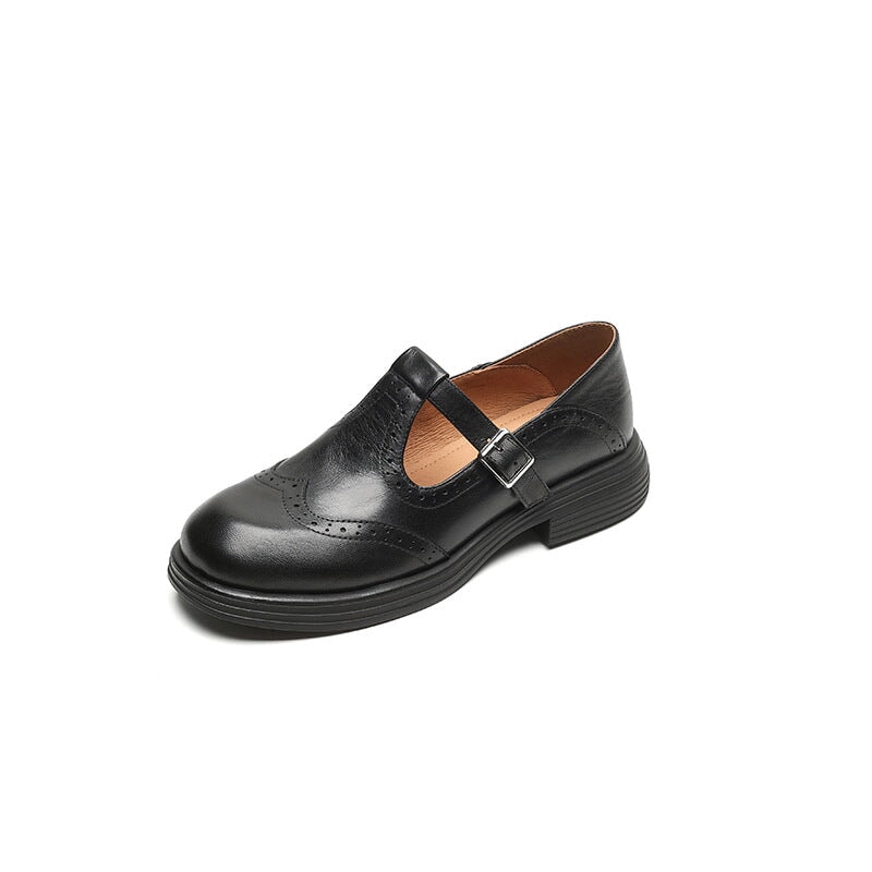 Women’s leather Mary Jane shoes with strap and cushioned sole designed for comfortable everyday walking.