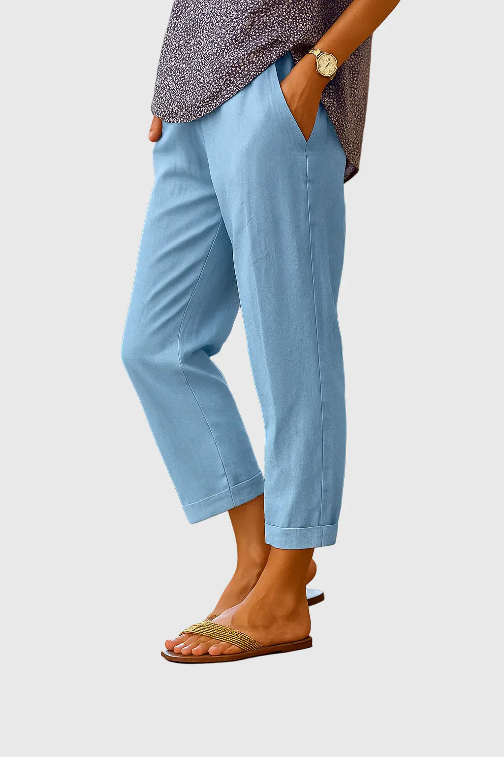 Women’s lightweight relaxed-fit pants with breathable fabric, elastic waistband, and tapered leg for comfortable everyday style.
