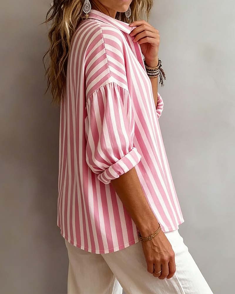 Women’s loose striped blouse with collar, relaxed fit, breathable fabric, and timeless vertical stripes for casual and versatile styling.