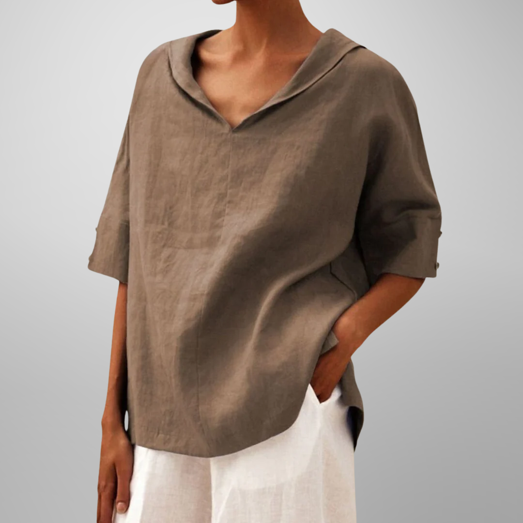 Women’s relaxed everyday blouse with soft drape, breathable fabric, and timeless minimal design for versatile styling.