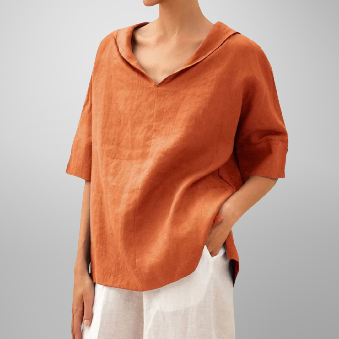 Women’s relaxed everyday blouse with soft drape, breathable fabric, and timeless minimal design for versatile styling.