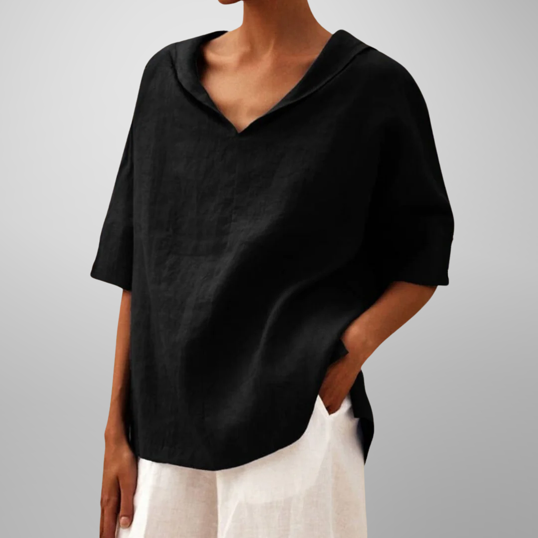 Women’s relaxed everyday blouse with soft drape, breathable fabric, and timeless minimal design for versatile styling.