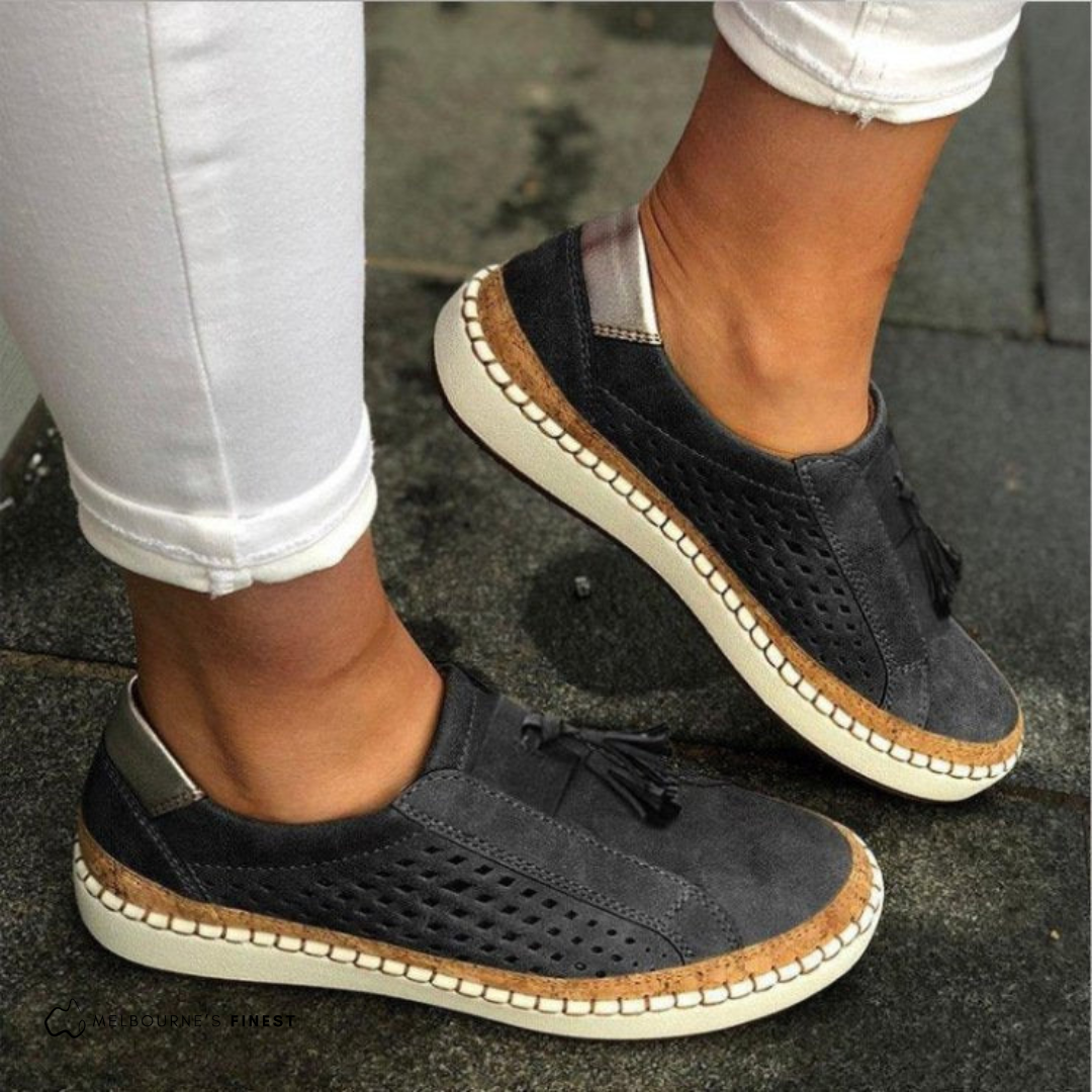 Women’s comfortable slip-on sneakers with breathable fabric and cushioned sole for everyday wear.