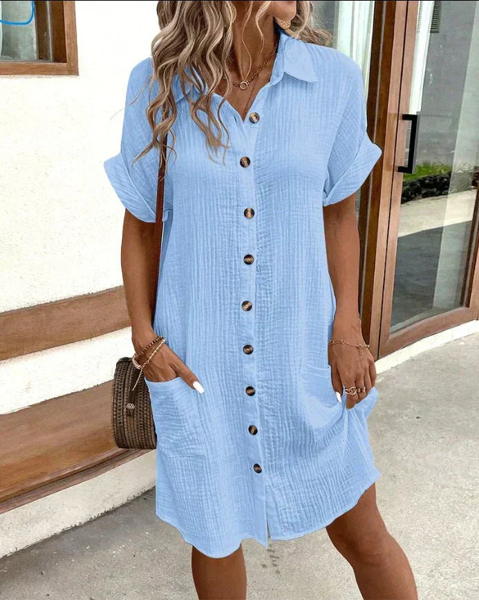 Women’s casual polo dress with collared neckline, breathable fabric, and functional pockets for everyday wear.