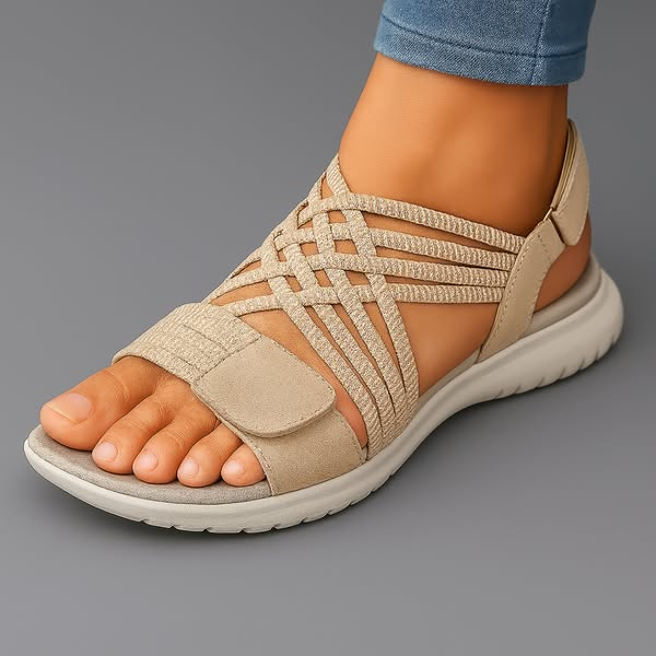 Women’s strappy sandals with cushioned footbed and adjustable closure designed for comfortable everyday walking.