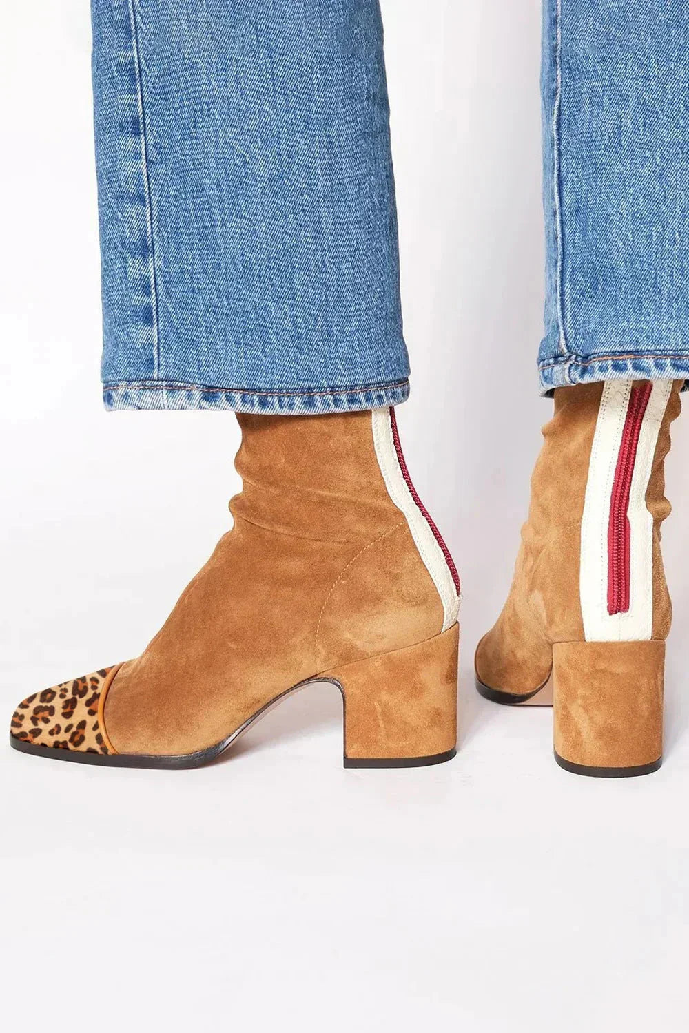 Women’s suede ankle boots with stable block heel and cushioned insole designed for comfortable everyday wear.