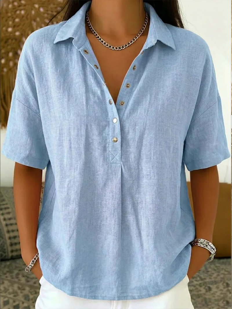Women’s summer blouse with classic collar, button placket, and relaxed fit, ideal for casual and versatile summer styling.