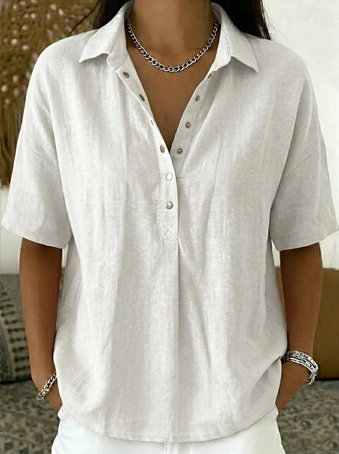 Women’s summer blouse with classic collar, button placket, and relaxed fit, ideal for casual and versatile summer styling.