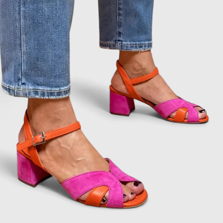 Women’s wedge heels with cushioned sole, adjustable ankle strap, and sturdy heel for stylish, all-day comfort.