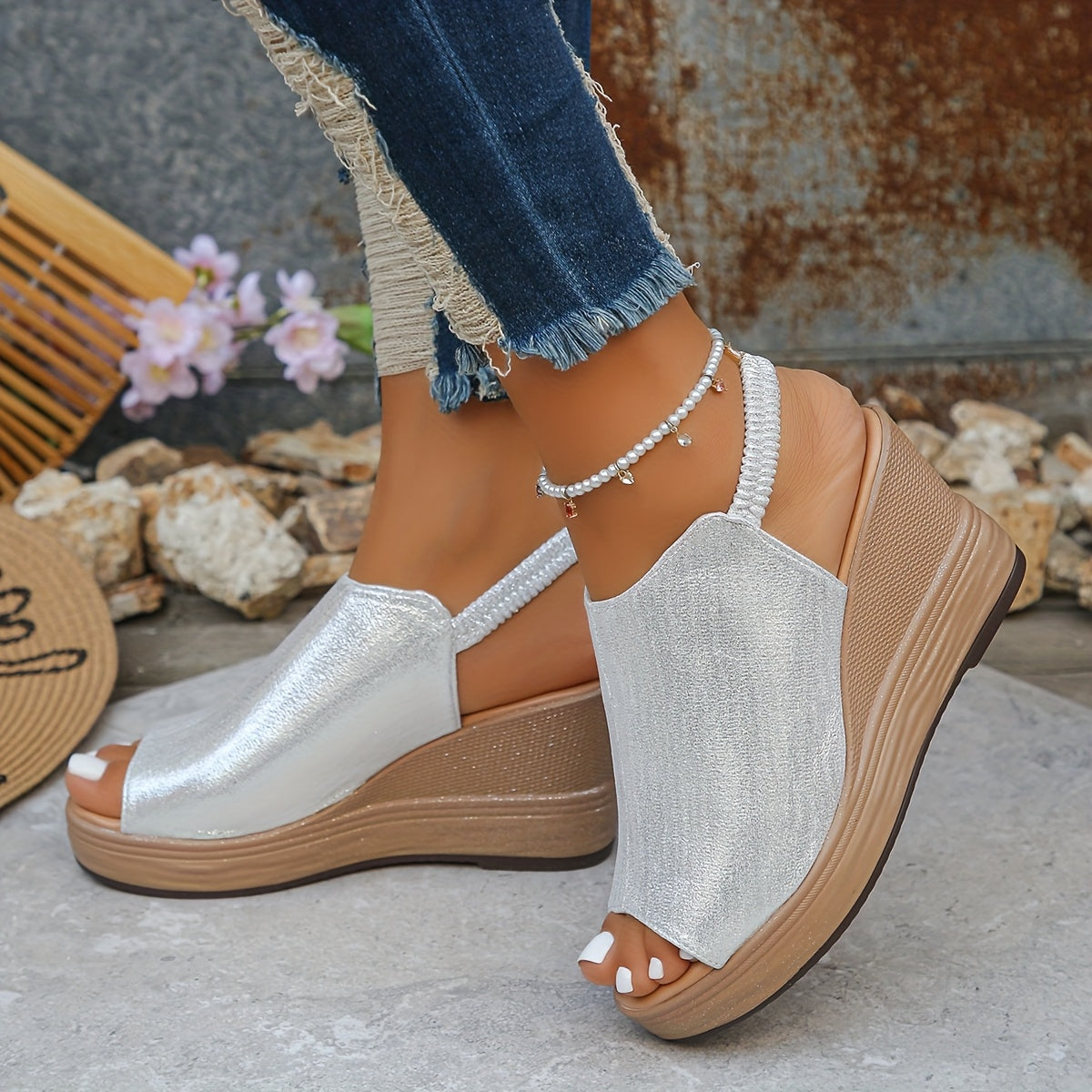 Women’s open-toe wedge sandals with cushioned platform sole and slip-resistant grip designed for comfortable everyday wear.