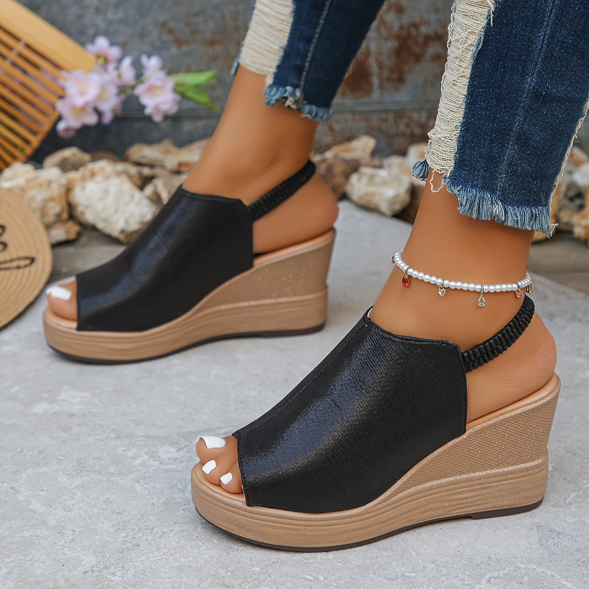 Women’s open-toe wedge sandals with cushioned platform sole and slip-resistant grip designed for comfortable everyday wear.