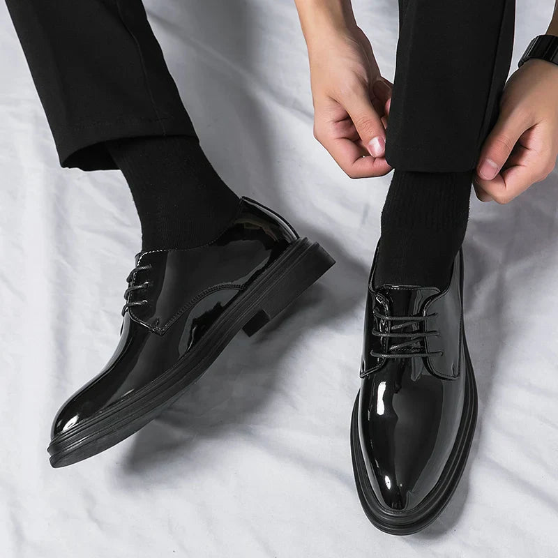 Men’s black derby lace-up shoes with high-gloss finish and sleek design