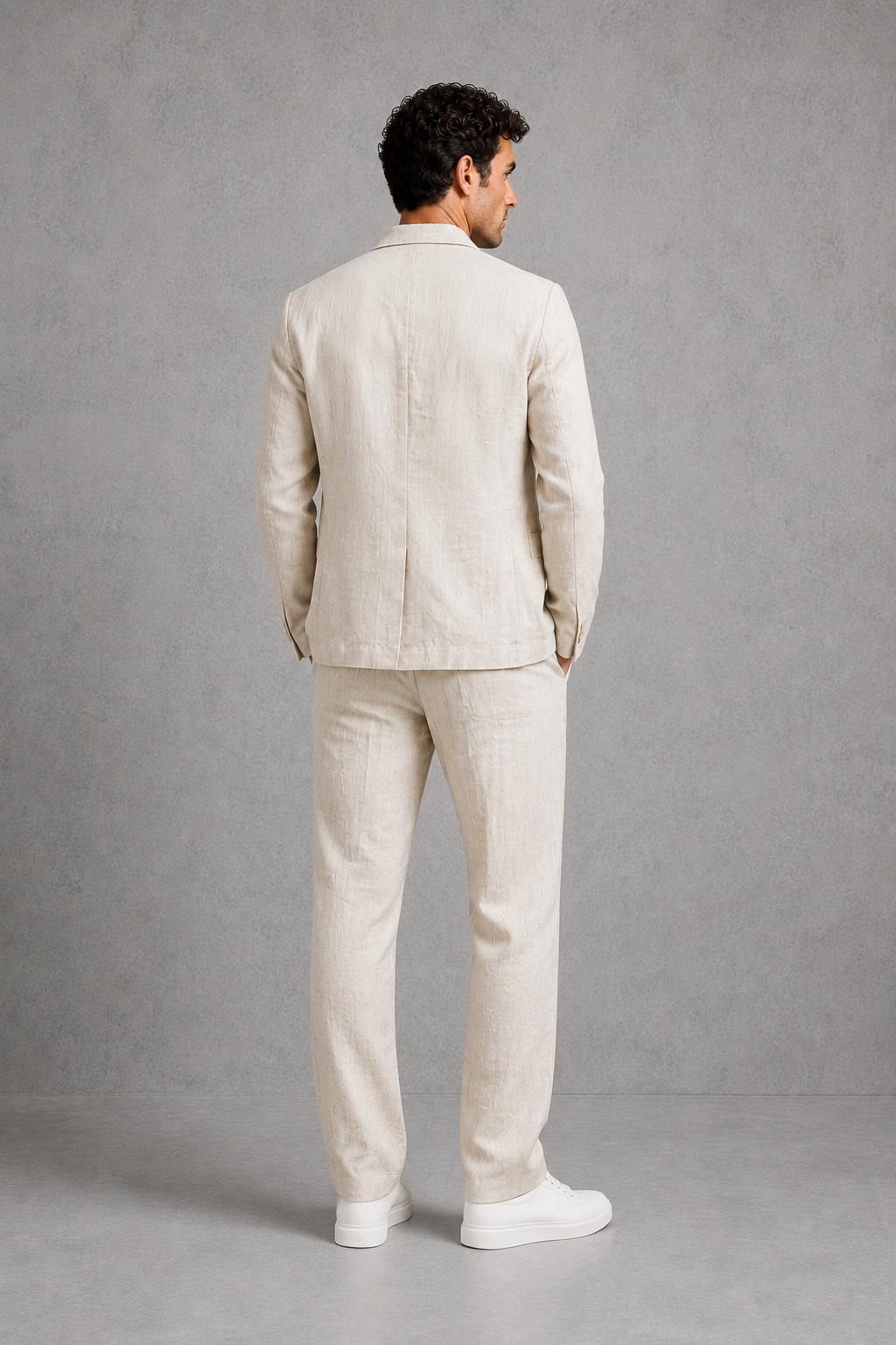 Men’s cotton-linen blend suit set featuring a relaxed tailored blazer and matching drawstring trousers.
