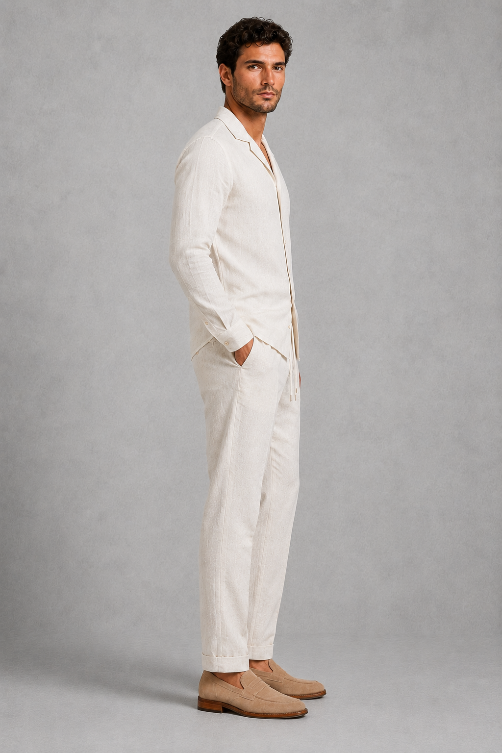 Men’s linen-style co-ord set featuring an open-collar button-up shirt and matching straight-leg trousers for casual summer wear.