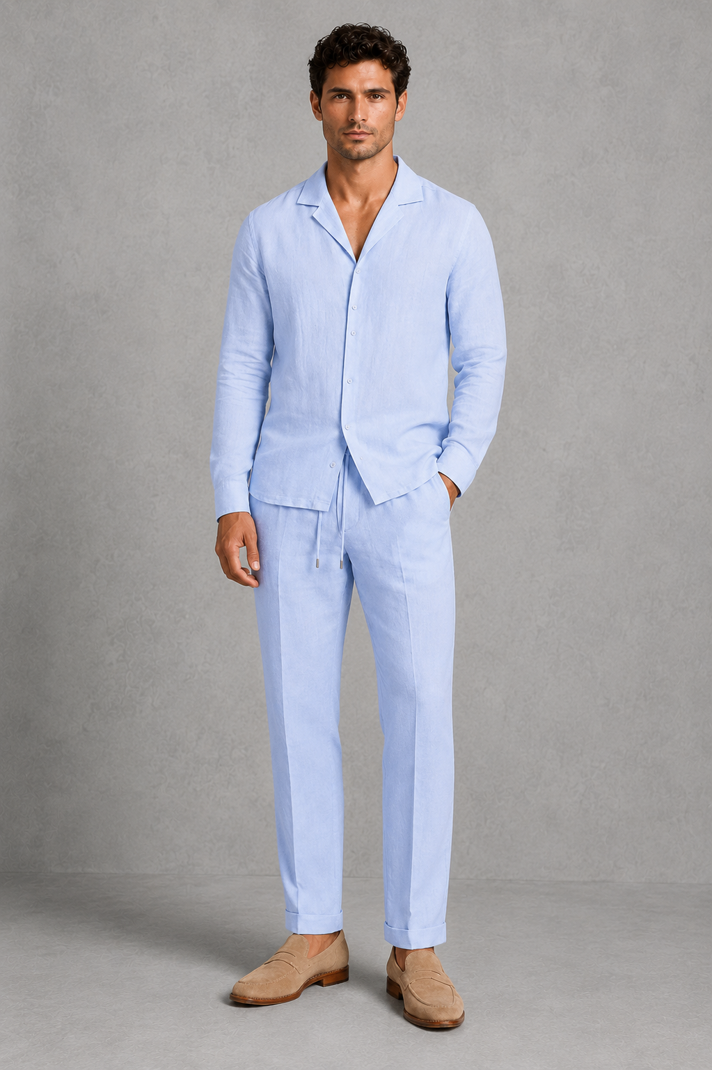 Men’s linen-style co-ord set featuring an open-collar button-up shirt and matching straight-leg trousers for casual summer wear.