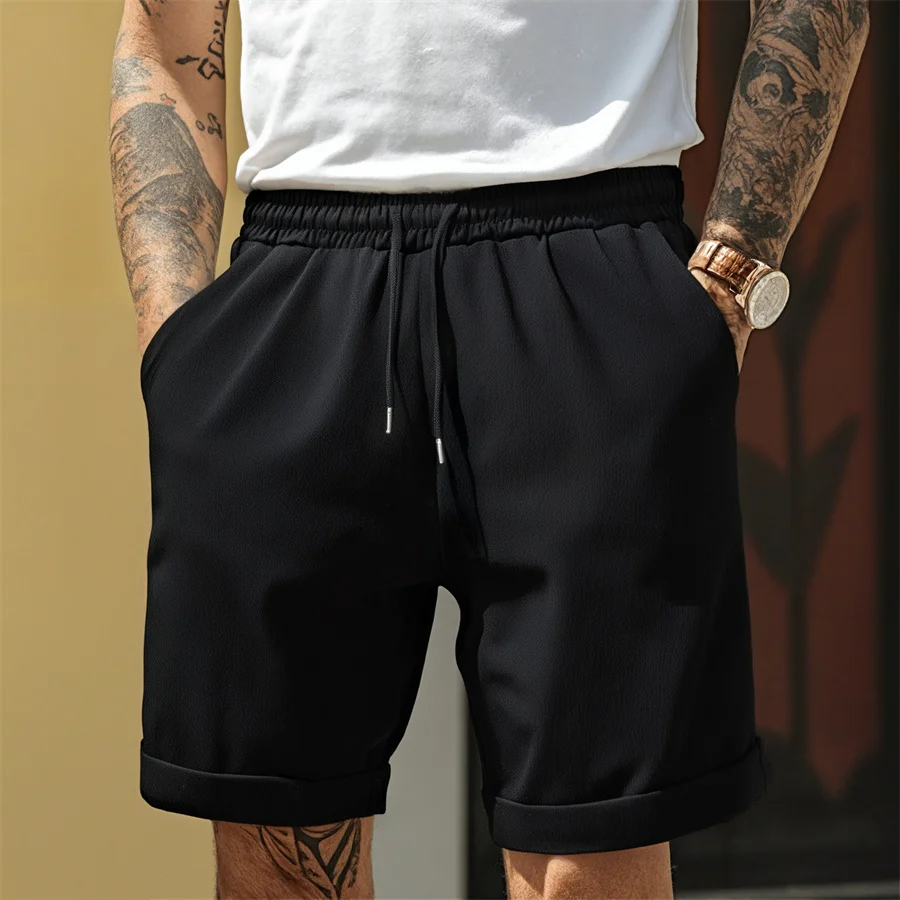 Men’s relaxed elastic waist shorts with drawstring metal tips turn up hem and side pockets for casual summer wear