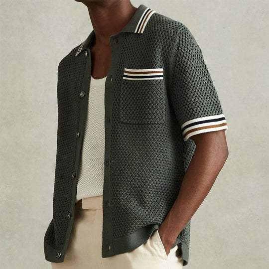 Men’s textured knit polo shirt with contrast stripe collar, chest pocket and button front for casual summer wear