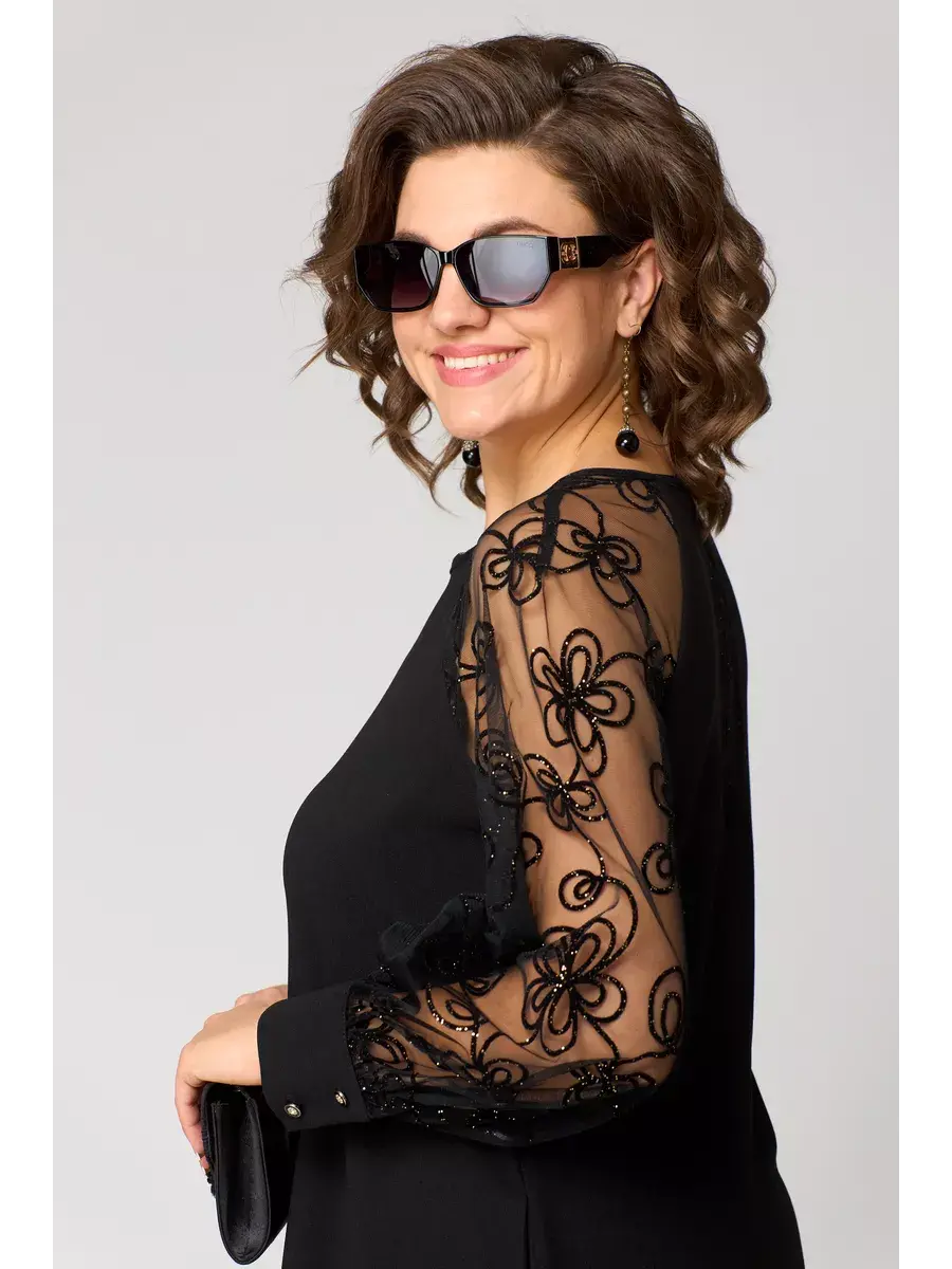 Women wearing a midi dress with refined sleeve details