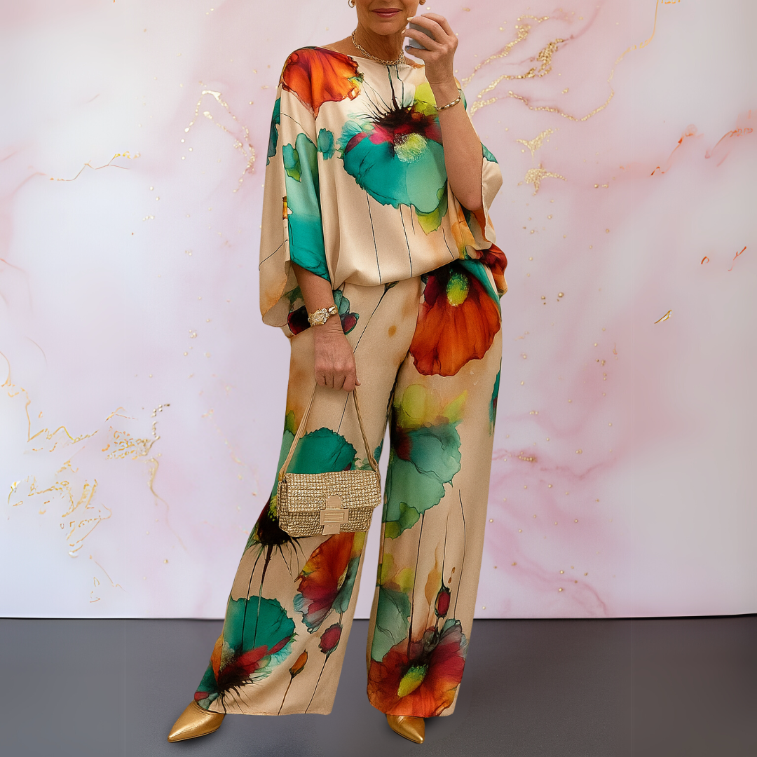 Women wearing a satin two-piece pants set with relaxed fit