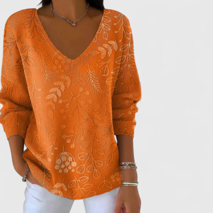 Women’s V-neck top with autumn pattern and relaxed fit