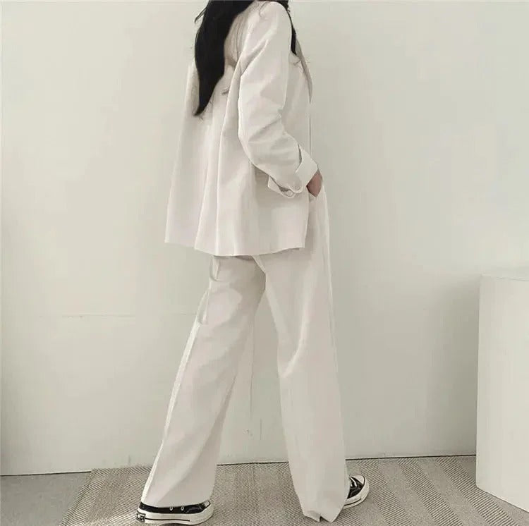 Women blazer and wide leg trouser suit set with high waist pants and structured fit for office workwear