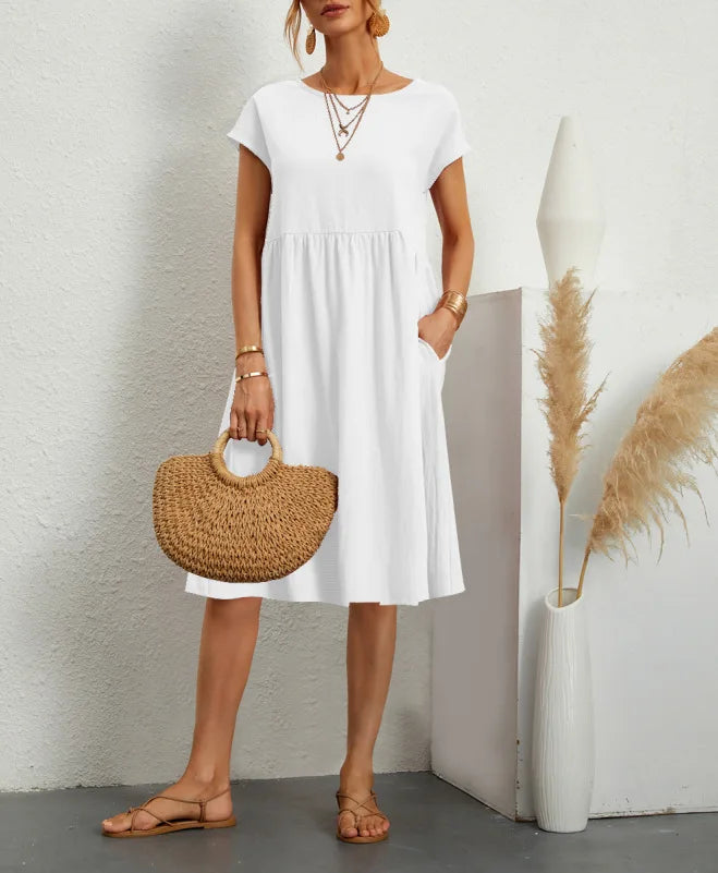 Women wearing a relaxed fit cotton linen vintage summer dress with breathable fabric for warm weather