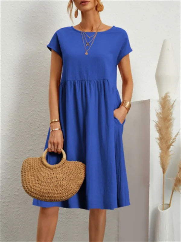 Women wearing a relaxed fit cotton linen vintage summer dress with breathable fabric for warm weather