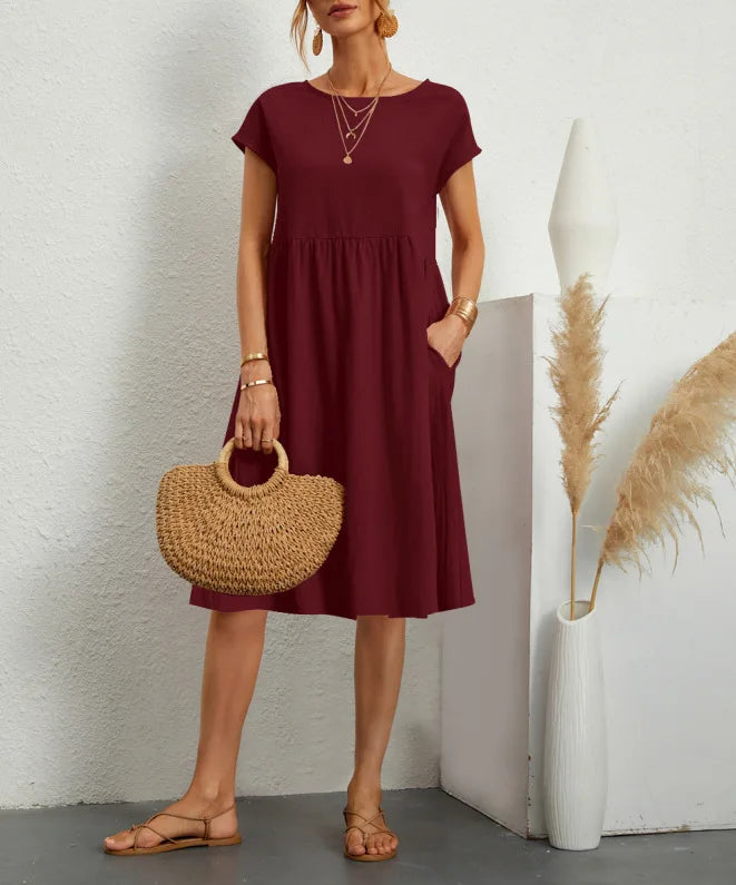 Women wearing a relaxed fit cotton linen vintage summer dress with breathable fabric for warm weather