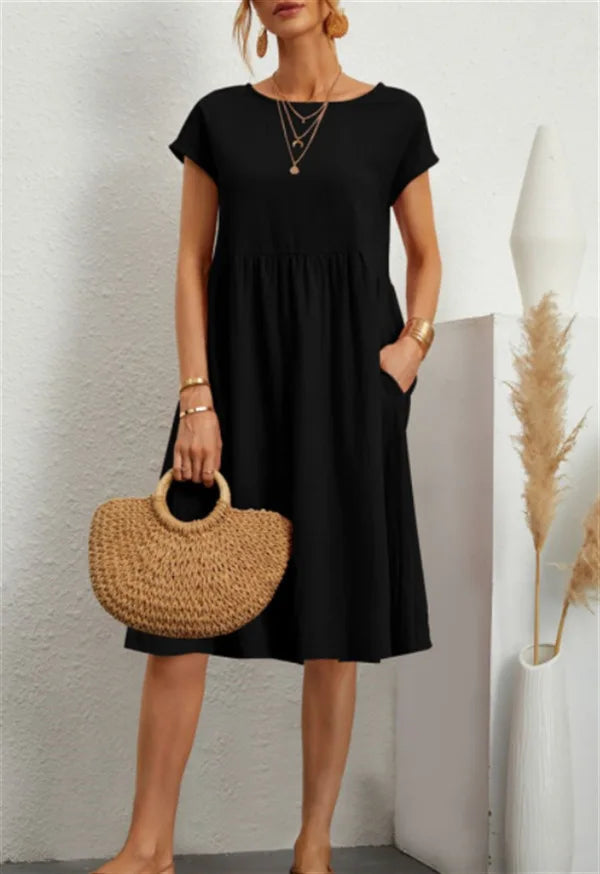 Women wearing a relaxed fit cotton linen vintage summer dress with breathable fabric for warm weather