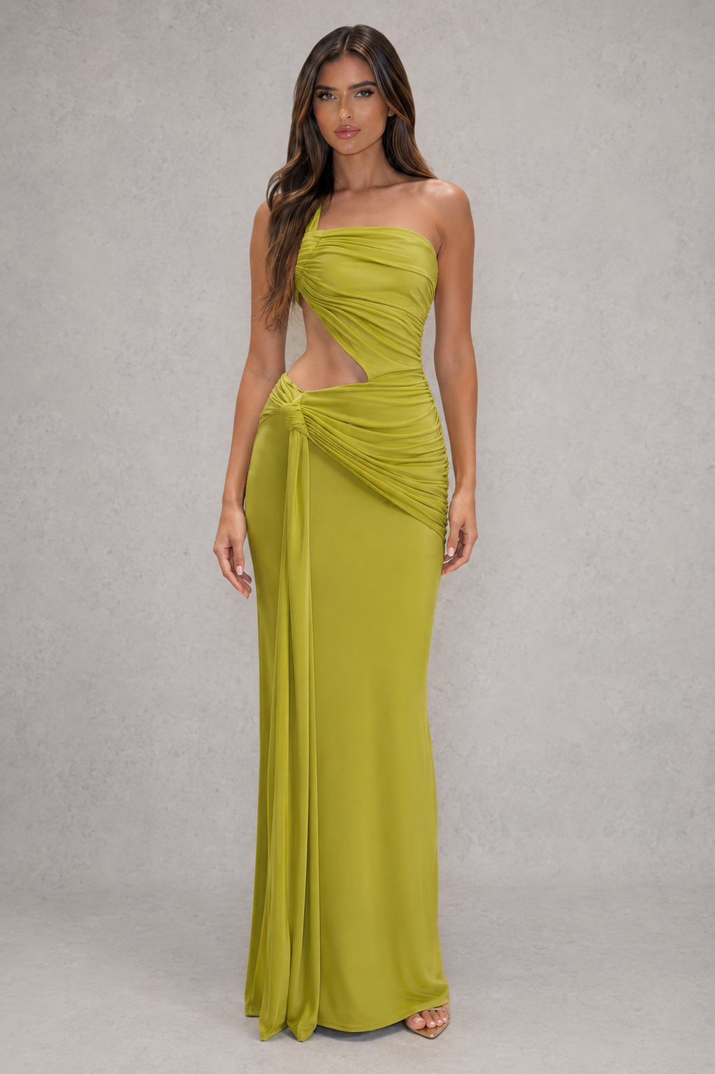 Women’s asymmetric cut-out jersey maxi dress with sculptural neckline, fitted silhouette and elegant wrap-style floor-length skirt.
