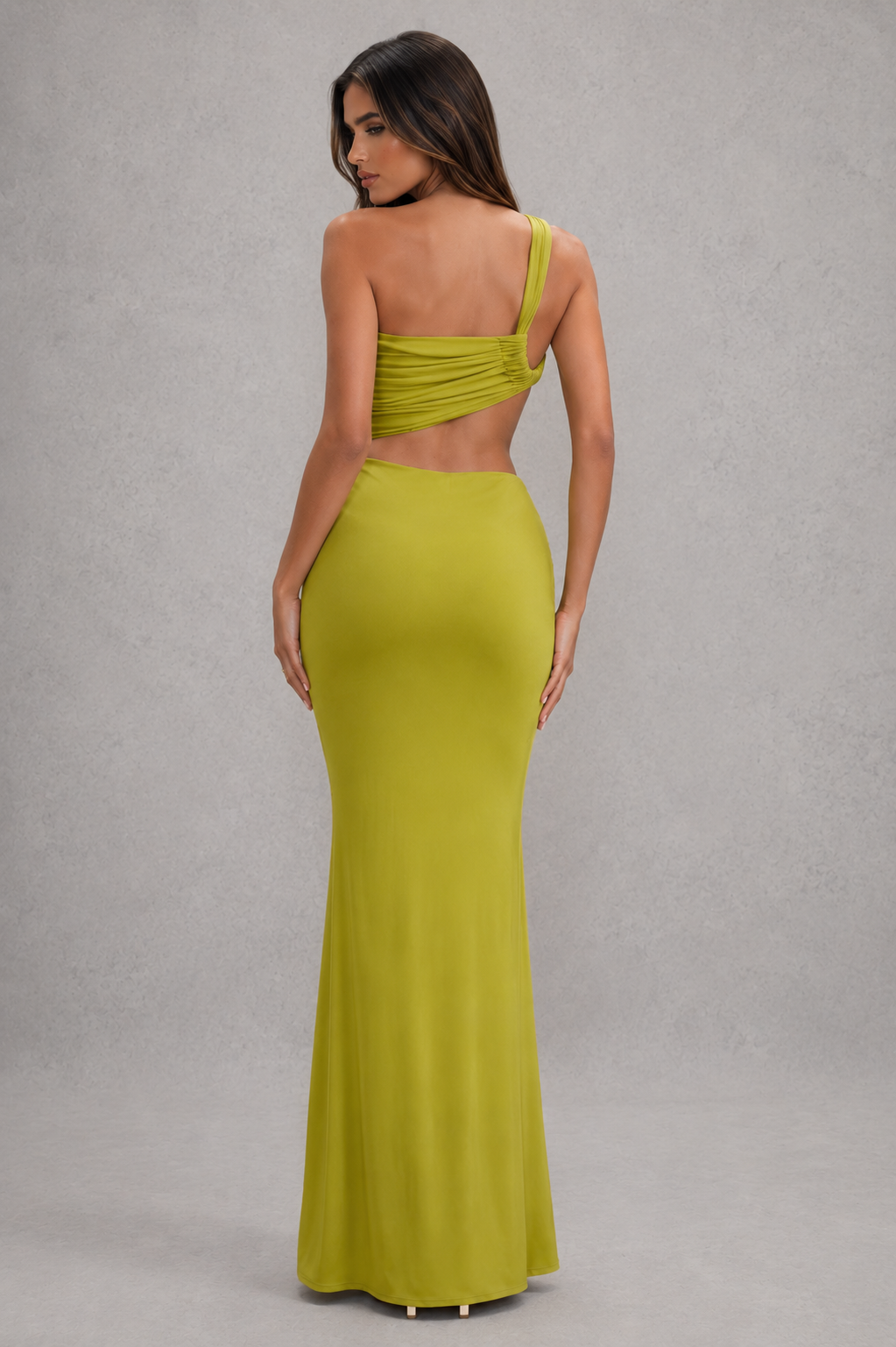 Women’s asymmetric cut-out jersey maxi dress with sculptural neckline, fitted silhouette and elegant wrap-style floor-length skirt.
