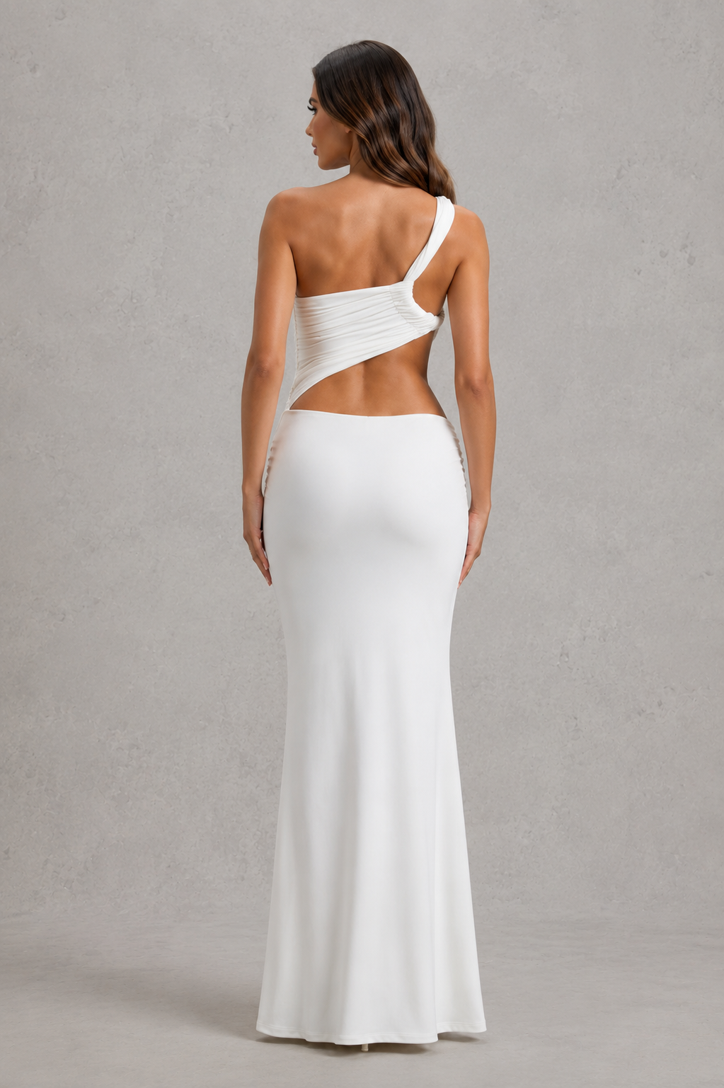 Women’s asymmetric cut-out jersey maxi dress with sculptural neckline, fitted silhouette and elegant wrap-style floor-length skirt.
